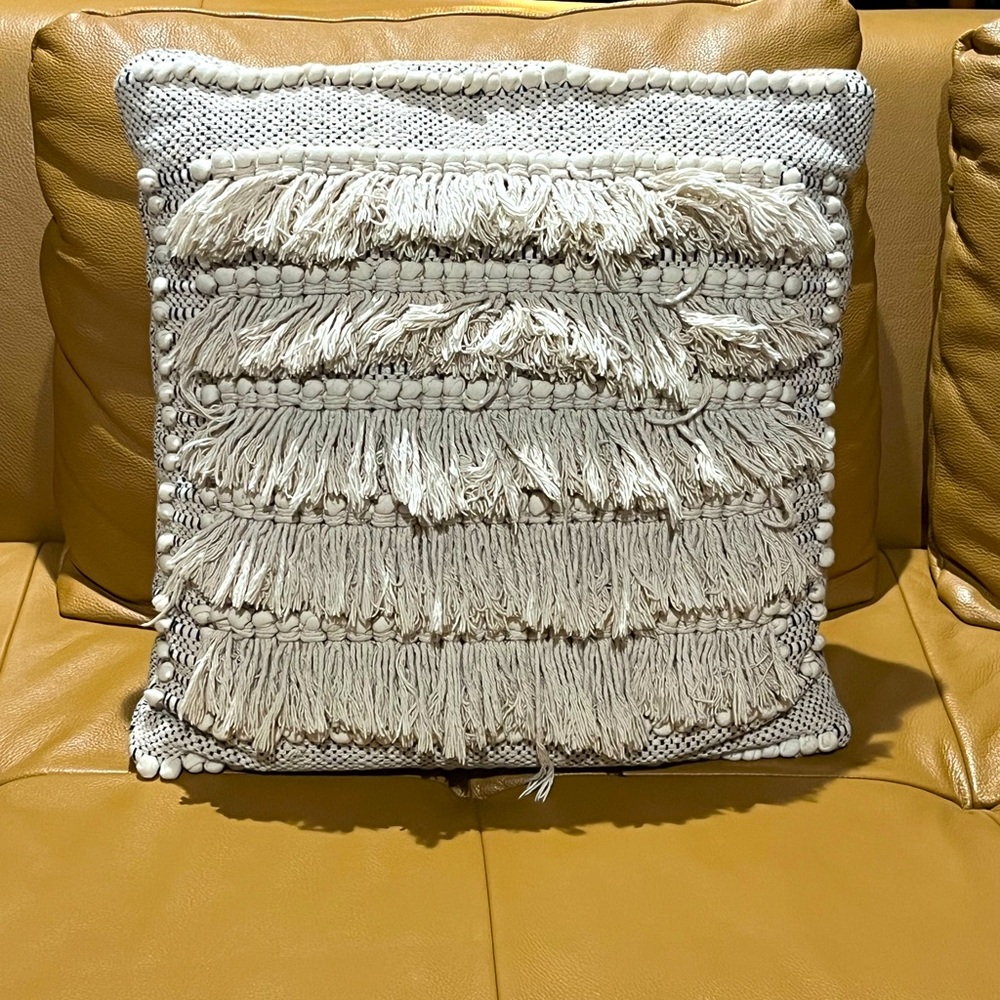Heavy textile and yarn fringe pillow , off white color. 18 x 18